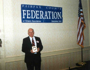 Last year's winner, Glenn, with award