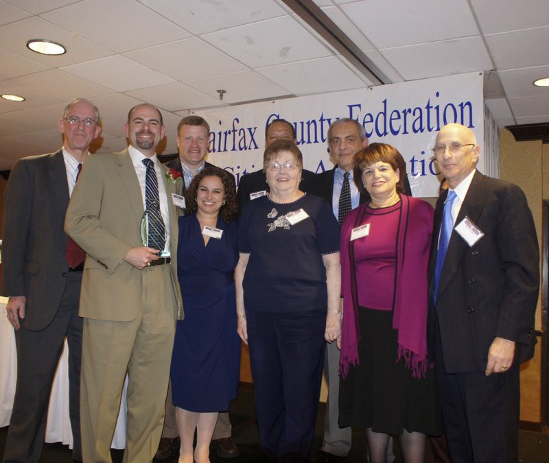 Federation Community Association Services Committee Chair Don Hinman, Special Gratitude Awardee Kyle Talente, Lee District Supervisor Jeff McKay, Bari Talente, Walter Clarke, Joyce and Vincent Talente, and Joanne and Samuel Levant