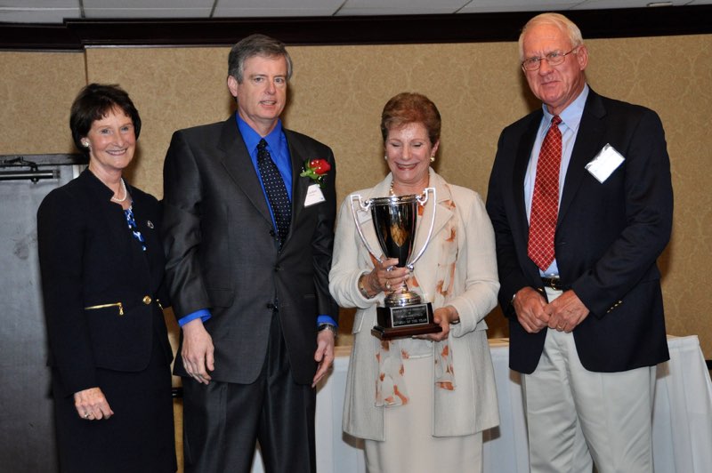 Chair of the Board of Supervisors Sharon Bulova, Federation President Rob Jackson, Citizen of the Year Janyce Hedetniemi (holding the Fairfax Federation Cup) and her husband, Moe Hedetniemi
