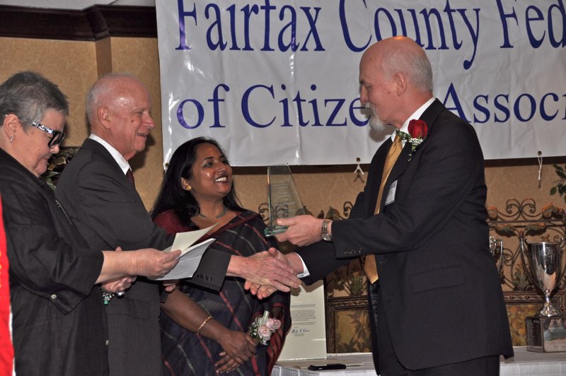 Reston Citizens Associations Tammi Petrine, Federation Officer Fred Costello and Federation President Tania Hossein Congratulate Terry Maynard upon His Receiving a Citation of Merit Award